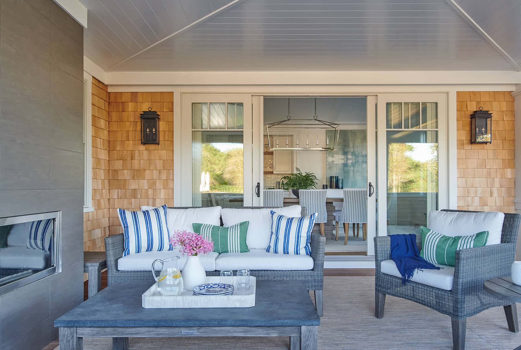 Nantucket, covered patio seating area with sliding doors to the kitchen